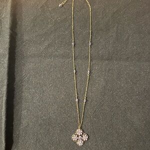 Liz Palacios necklace with purple stones